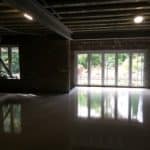 Floor Screed Services - poor lighting shiny screeded floor