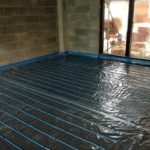 Floor Screed Services - underfloor heating laid - blue pipework