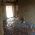 Covering Underfloor Heating Pipes with Liquid Screed