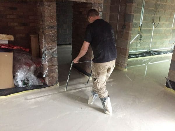 Levelling Out a Liquid floor Screed in extension