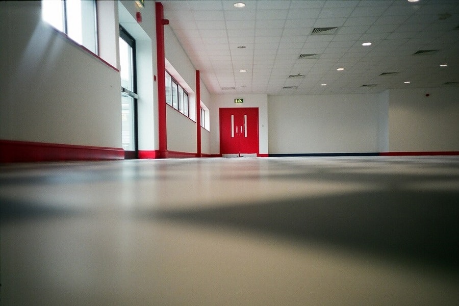 Level Screed Floor from a low floor shot red doors. Level flooring