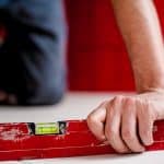 close up of leveller, spirit level- sand and cement screed