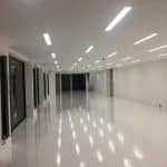 Finished empty car showroom, newly screeded floor