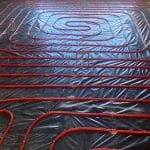 Horizontal Under Floor Heating system installation - close up of flooring pipes