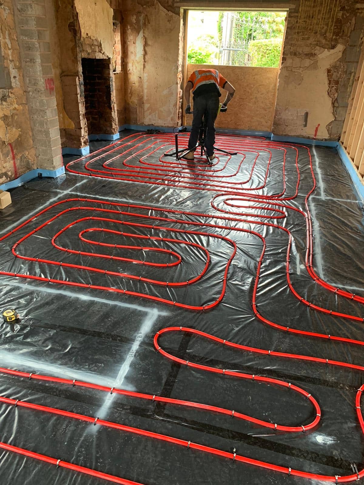 single gentleman laying red Under Floor Heating Pipes