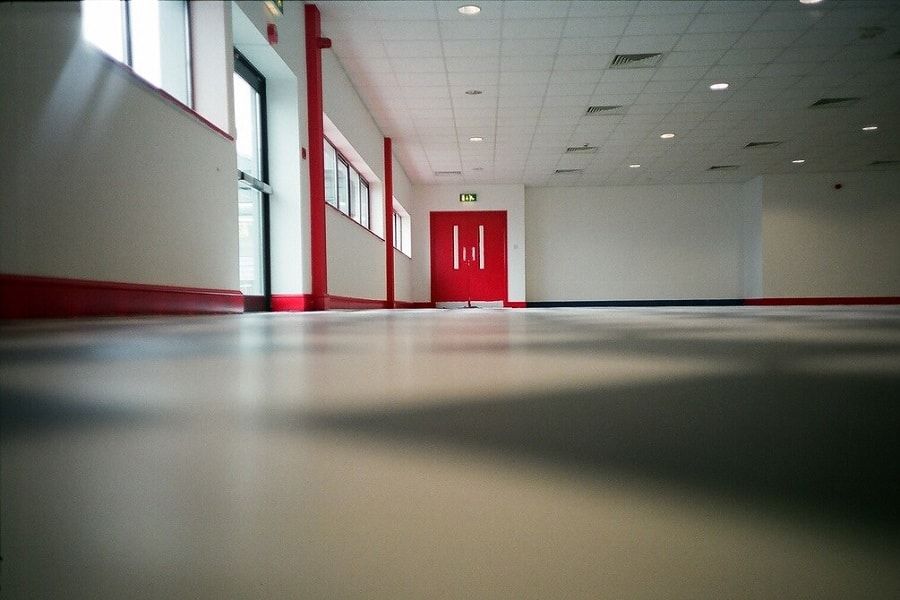 complete liquid screeding application indoor hall, red doors
