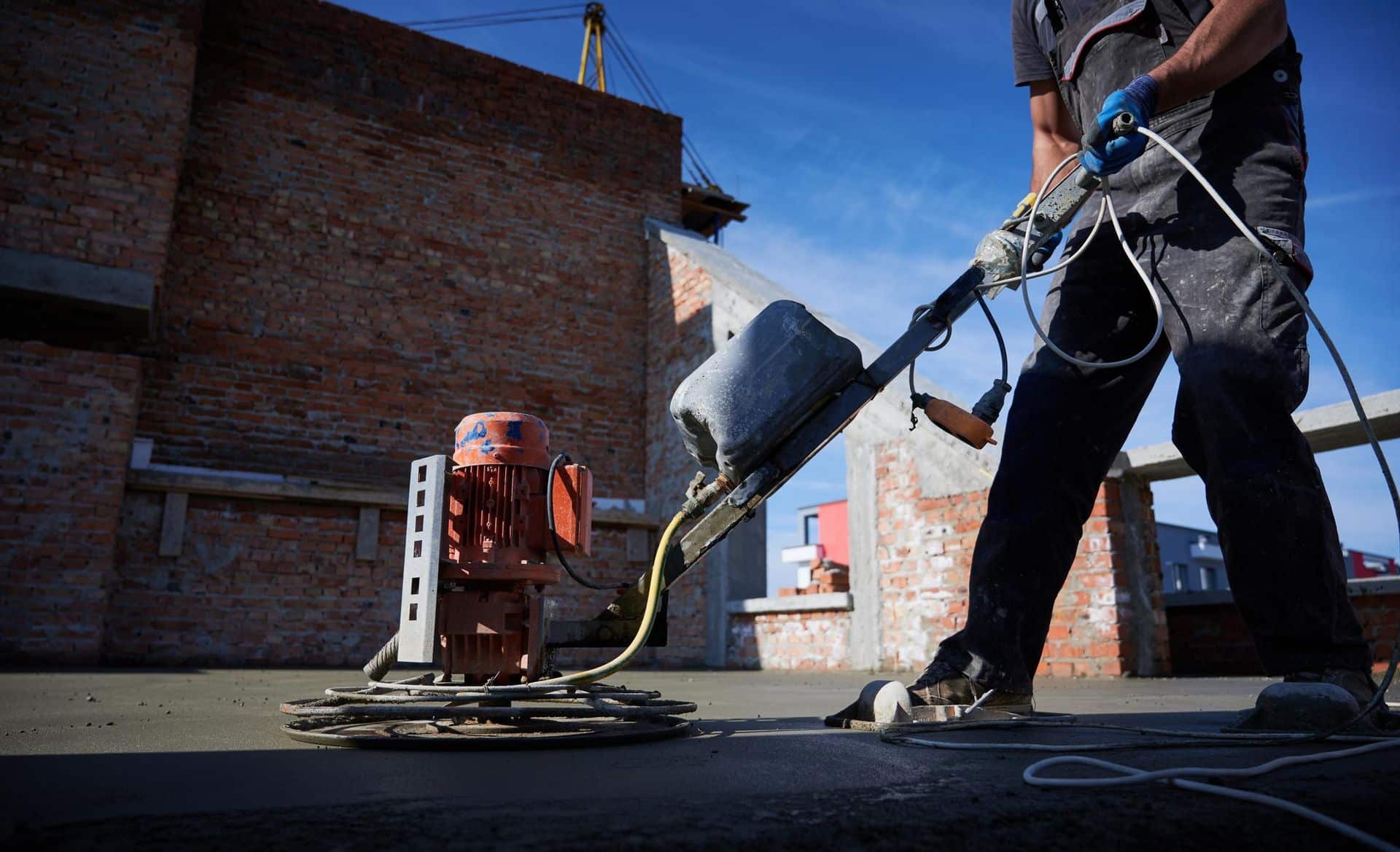 outdoor liquid floor screed, polishing and smoothing laying a liquid screed