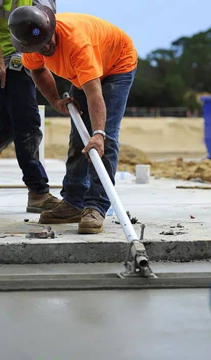 outdoors liquid screed flooring, gentleman with orange t-shirt