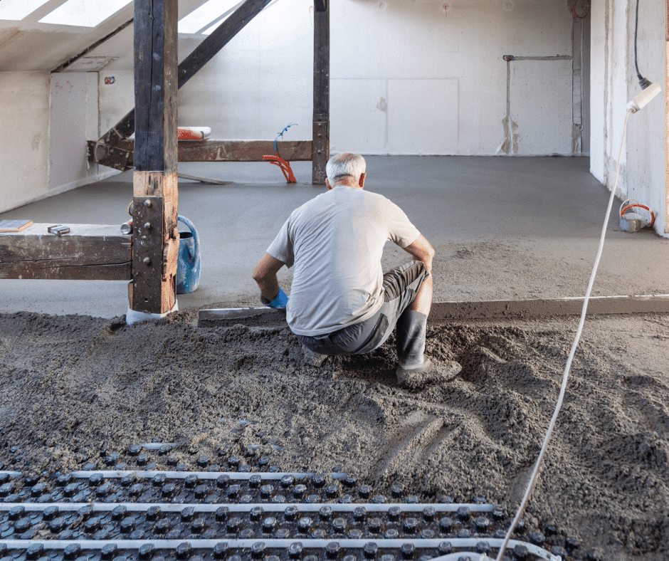A GM Floor screeder applying screed for a Northampton-based business