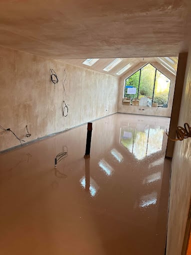 An underfloor heating Birmingham system with liquid screed installed by GM Floor Screeds