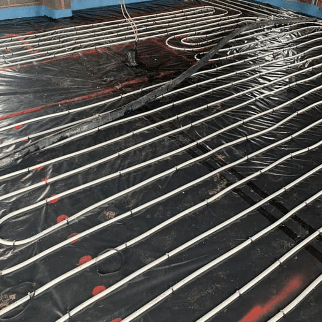 Underfloor heating installed with screed in a domestic property by GM Floor Screeds