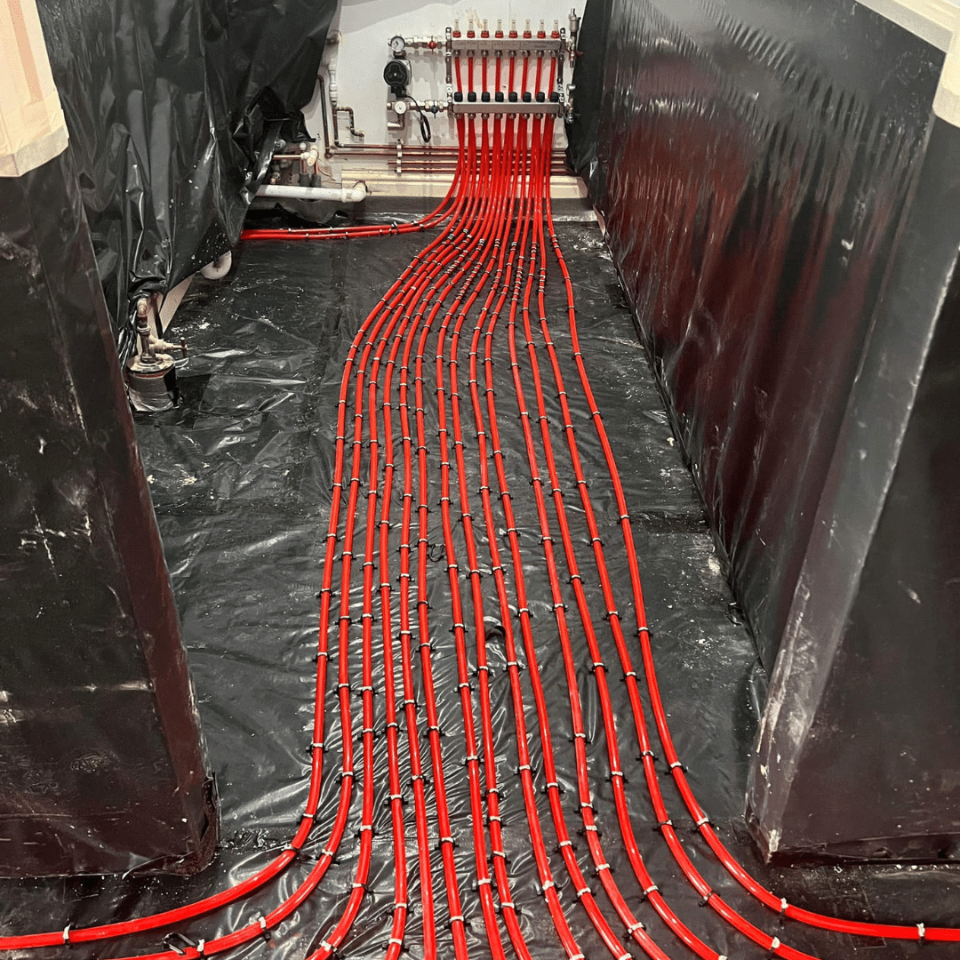 Underfloor heating pipes installed with screed in a domestic property by GM Floor Screeds