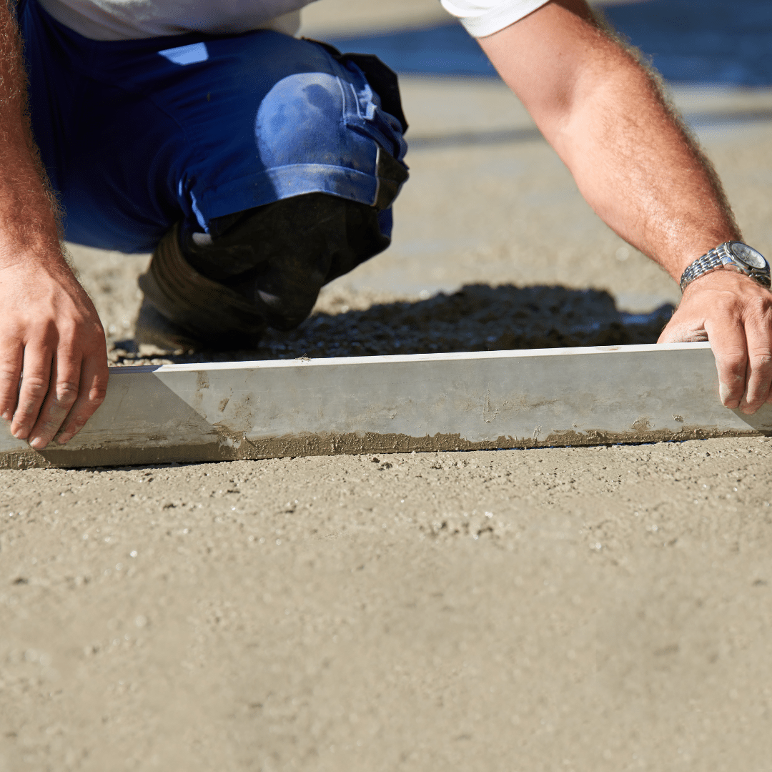 A GM Floor Screeds contractor installing sand and cement screeds